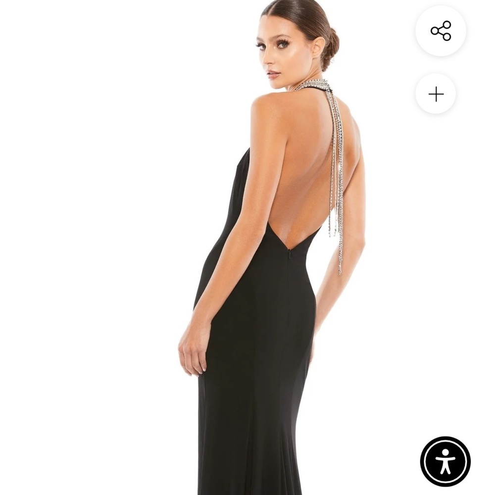 Not new it’s now used Mac Duggal dress